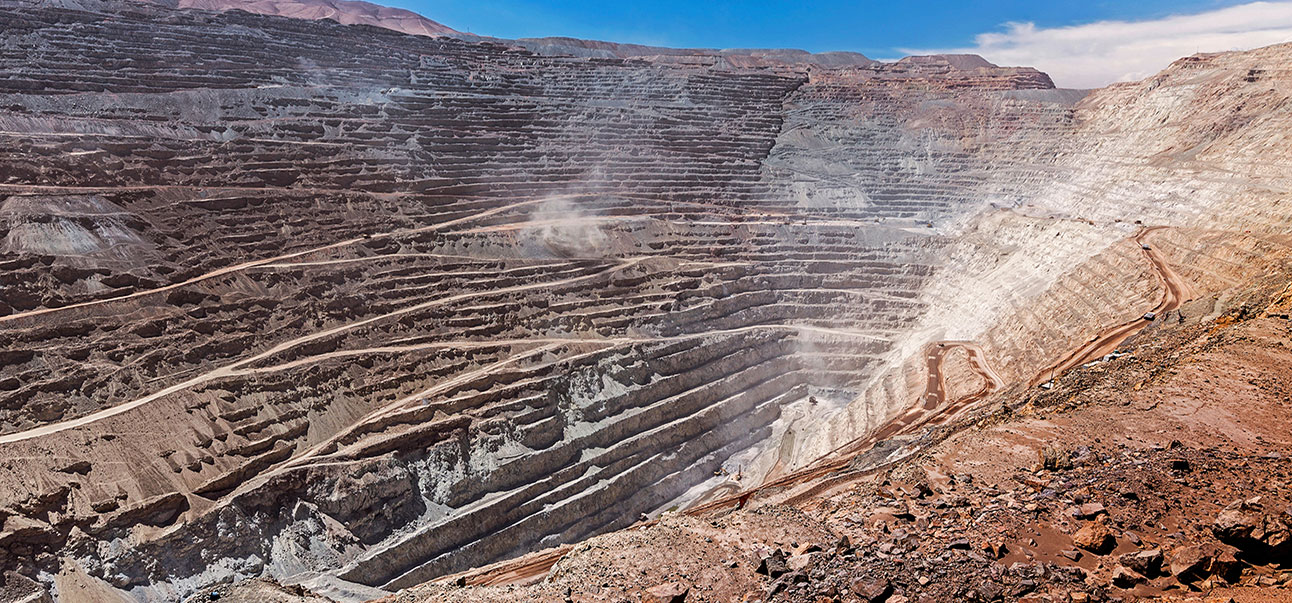 The picture shows Chuquicamata open pit mine, the largest copper mine in the World. The mine is continuously monitored using geotechnical instrumentation to grant the saferty of the workers.